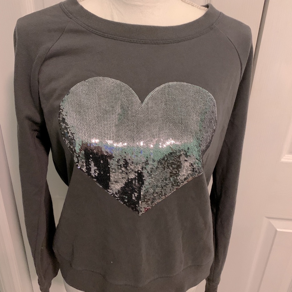 Victoria’s Secret fleece sweat shirt.